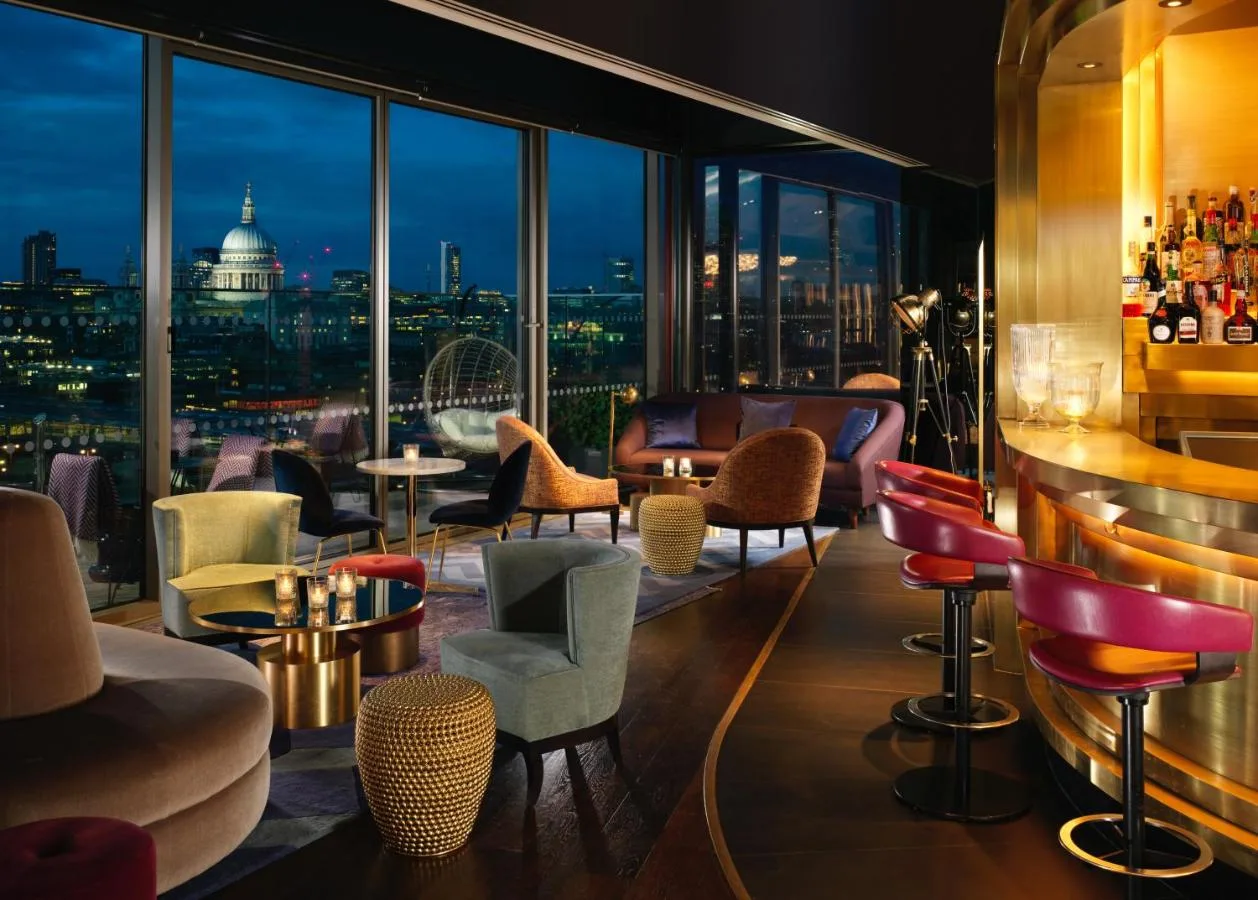 a bar at a hotel with a view of the building at Sea Containers London in London
